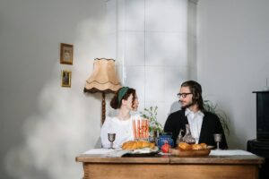 couple having traditional jewish food