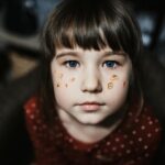 girl in red polka dot clothing